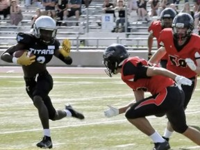 Brantford Bisons defenseman Marco Di Nino has his eye on an Oakville Titans ball carrier during a recent Ontario Summer Football League U18 game.