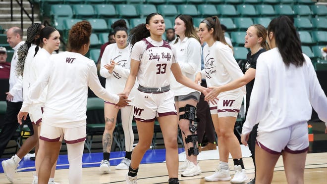 West Texas A&M's Jayla Burgess enters the court prior to a game for the Lady Buffs basketball game.